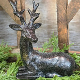 Glittery Black Laying Deer